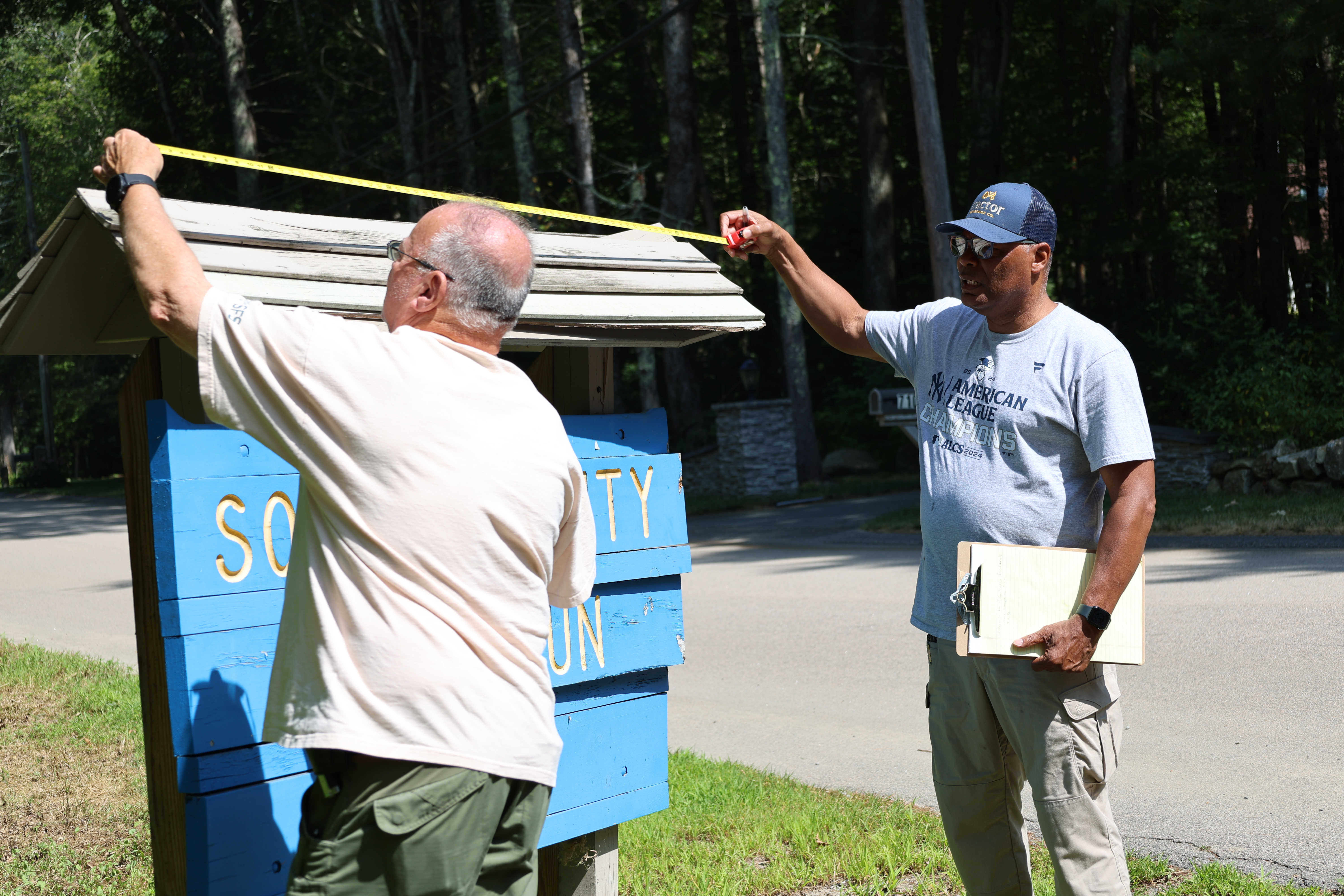 Setting up the Sign at Music Festival